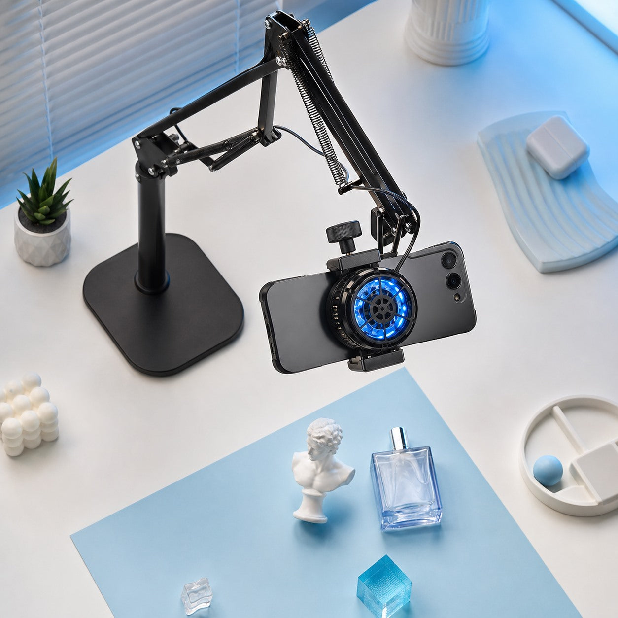 Overhead filming phone holder setup for product demos and content creation